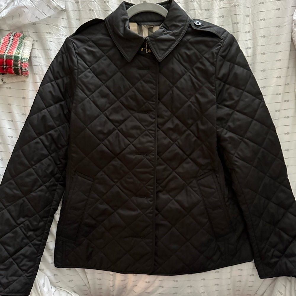 Used once Authentic Burberry quilted black jacket